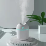 Sleek White Mini Humidifier with Subtle Blue Accent Light