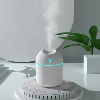 095.webp Sleek White Mini Humidifier with Subtle Blue Accent Light - Image 1